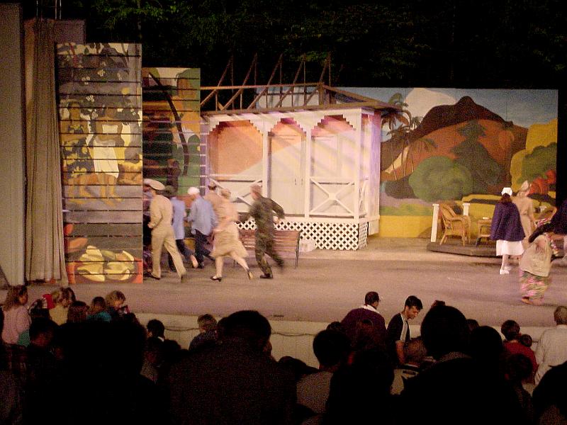 cast running off stage.png